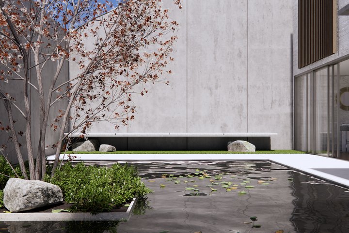 Reflecting pool beside a concrete wall, with a floating stone bench, boulders and a flowering tree
